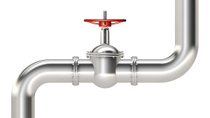 metal pipe with a red valve, pipe cleaning