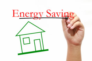 drawing of a house and a hand writing: Energy Saving